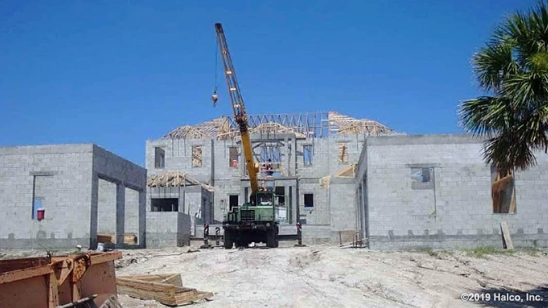 Installation of roof trusses, framing, and rafters by the Halco Roof Contracting team.